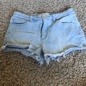light wash frayed denim shorts